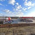 Person experiencing chest pain at gas station