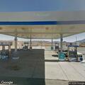 Female with head pain at Coso Junction Chevron station