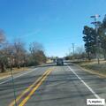 Woman trespassing and walking along Huntsville Road