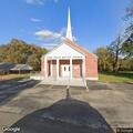 Officer checks vehicle at church parking lot