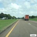 Car swerving in and out of traffic on Highway 412