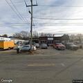 Traffic crash with injuries at auto repair shop