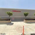 Officer checks suspicious vehicles behind Target