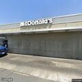 Suspicious person with metal pole at restaurant