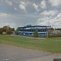 Elderly woman with chest pain at Burlington Athletic Stadium