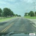 Abandoned red jeep blocking southbound lane