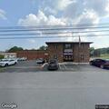 Woman reporting credit card fraud at local jail