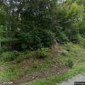 Single-car crash in ditch with animals inside