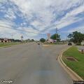 Person experiencing breathing difficulties at intersection