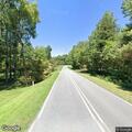 Person reporting chest pain at McLeansville Road