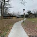 Person experiencing chest pain at Bruce Pine Lodge