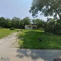 Loose aggressive dog reported on Hogan Road