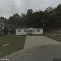 Person experiencing abdominal and back pain in Clinton