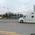 Elderly man in red wheelchair welfare check at Timberloft