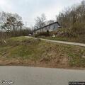 Unwanted person lying under mailbox at residence