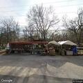 Man experiencing breathing difficulty in vehicle at cemetery