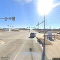 56-year-old woman having breathing problems at bus stop