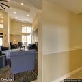 Unconscious woman found slumped over vehicle at hotel
