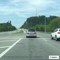 Vehicle crashes down embankment after driver seizure