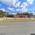 Man in red truck at AutoZone reports chest pain