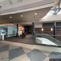Person feeling sick near Delta ticket counter at airport
