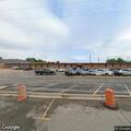 Unresponsive man breathing at school gym