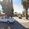 Person unresponsive with heavy breathing near Davis Street