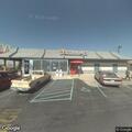Person with severe back and kidney pain at McDonald's