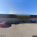 Vehicle hits light post at Dollar General