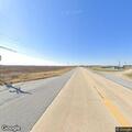Officer escorting oversized load on Highway 67