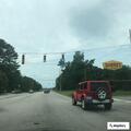 Vehicle hits street sign and fire hydrant