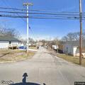 Traffic stop of red Chevrolet Tahoe on Hall Street