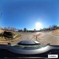 Motorcycle laid down at highway junction, no injuries