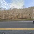 Single vehicle rollover down embankment on Highway 421