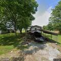 Injured hawk reported in yard on Tom Counce Road