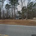 Tree down on vehicle and blocking NC 39 roadway