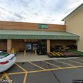 Two vehicles crash at store parking area