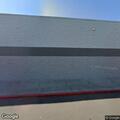Man selling items outside Walmart entrance