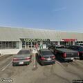 Traffic stop on silver Toyota near liquor store