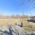 Unresponsive female found behind residence moves and breathes