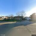 Unattended dogs reported in backyard near 8th Street in Orange Cove