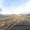 Large field fire with hay and tires burning