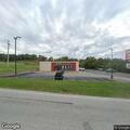 Pedestrian with tent in ditch causing traffic issues