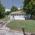 Smoke coming from attic in house fire