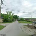 Woman trespassing and throwing rocks at house