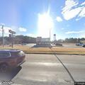 Two-vehicle crash with fluid leak, no injuries