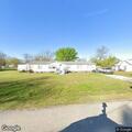Person banging head against wall near Afton
