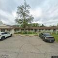 Unresponsive woman breathing at nursing home