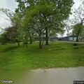 Officer assists with snake in car engine