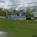 Suspicious vehicle parked by shed at home